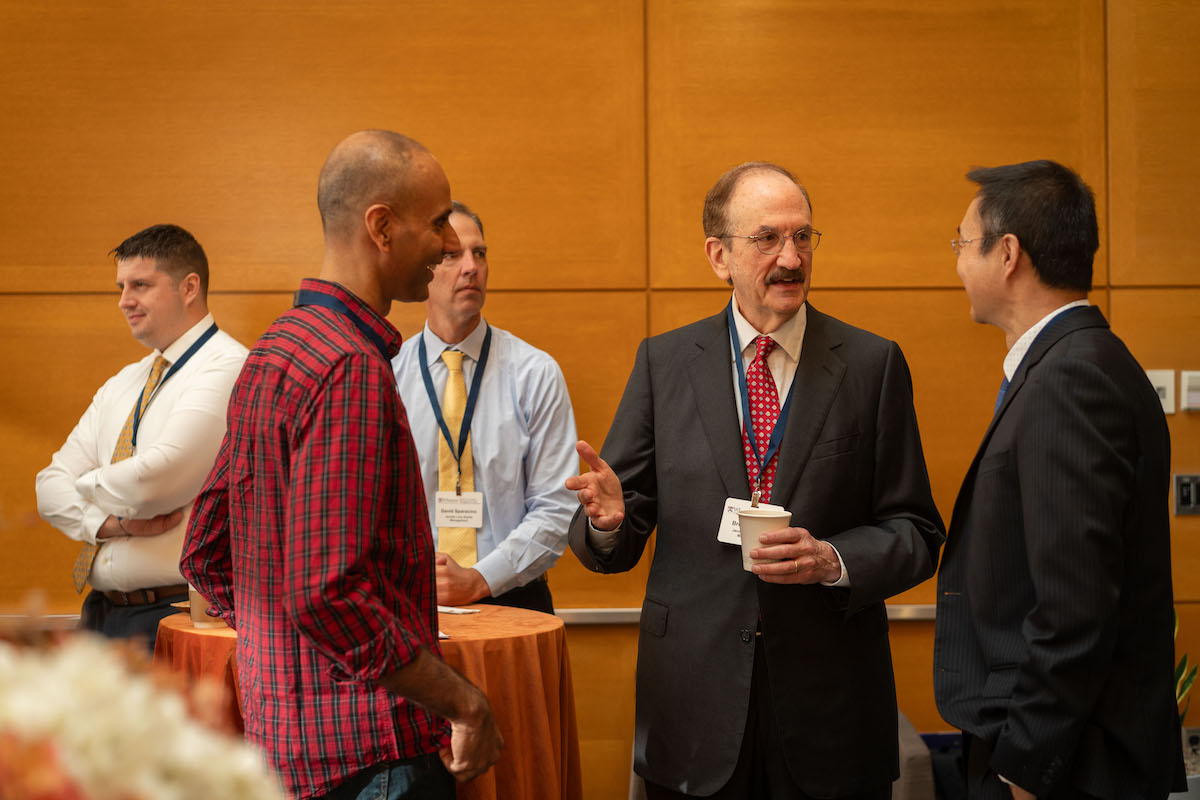 Bruce Jacobs speaks with Frontiers in Quantitative Finance Conference participants