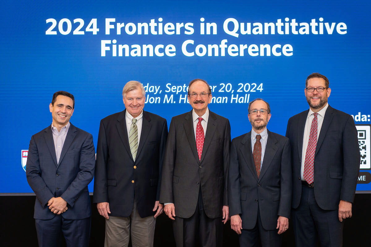 Joao Gomes, Craig MacKinlay, Bruce Jacobs, Ken Levy, and Chris Geczy gather for a photo at the 2024 Frontiers in Quantitative Finance Conference.