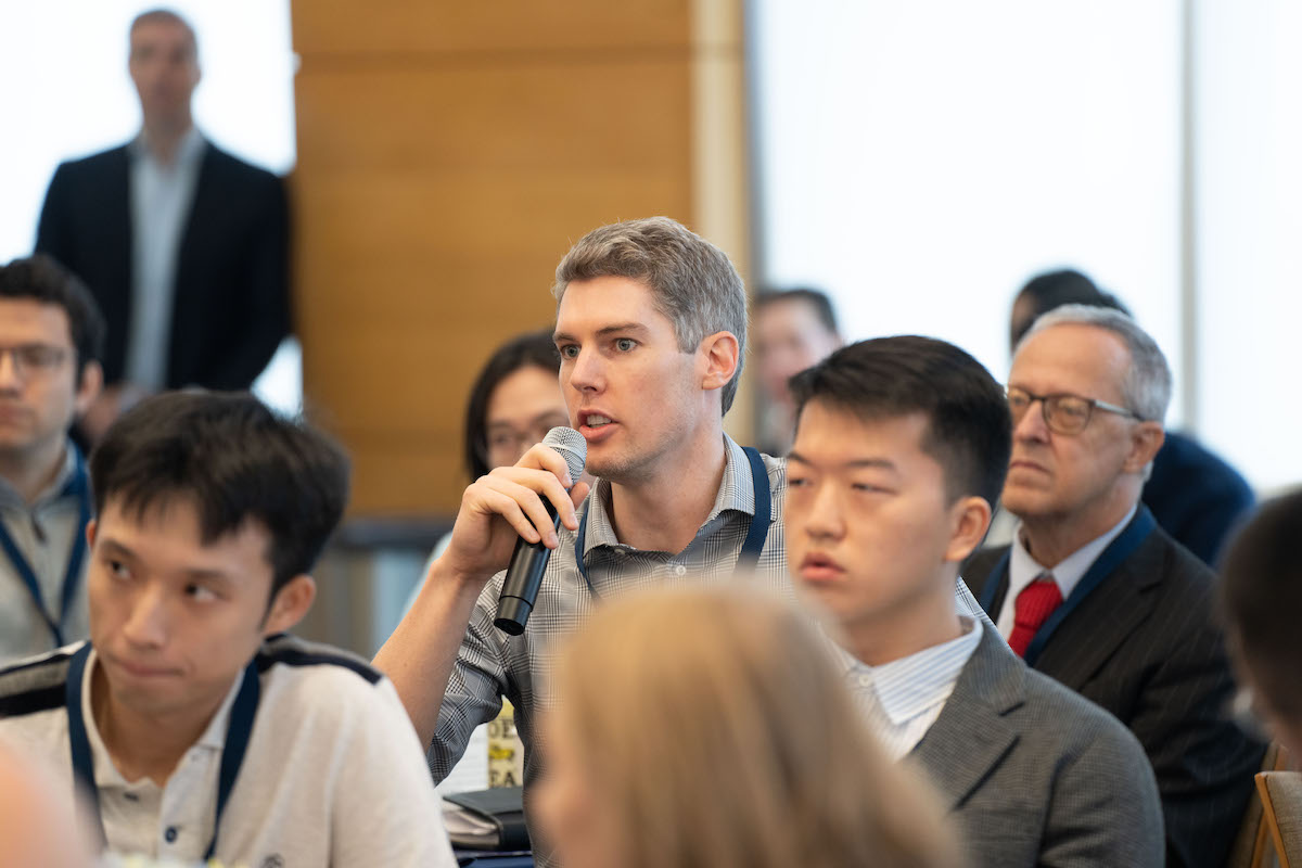 Sean Myers asks a question from the audience at the Frontiers in Quantitative Finance Conference