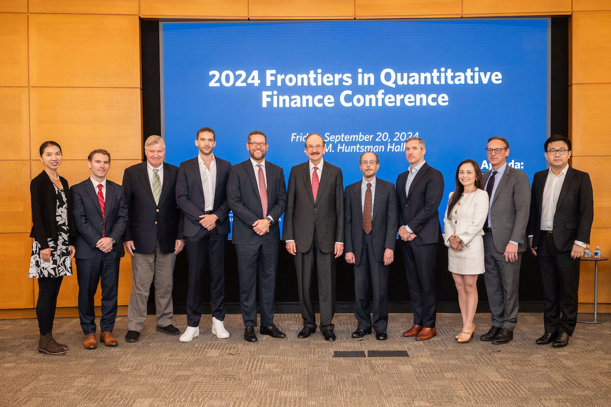 All of the Frontiers in Quantitative Finance Conference speakers and presenters gather for a group photo