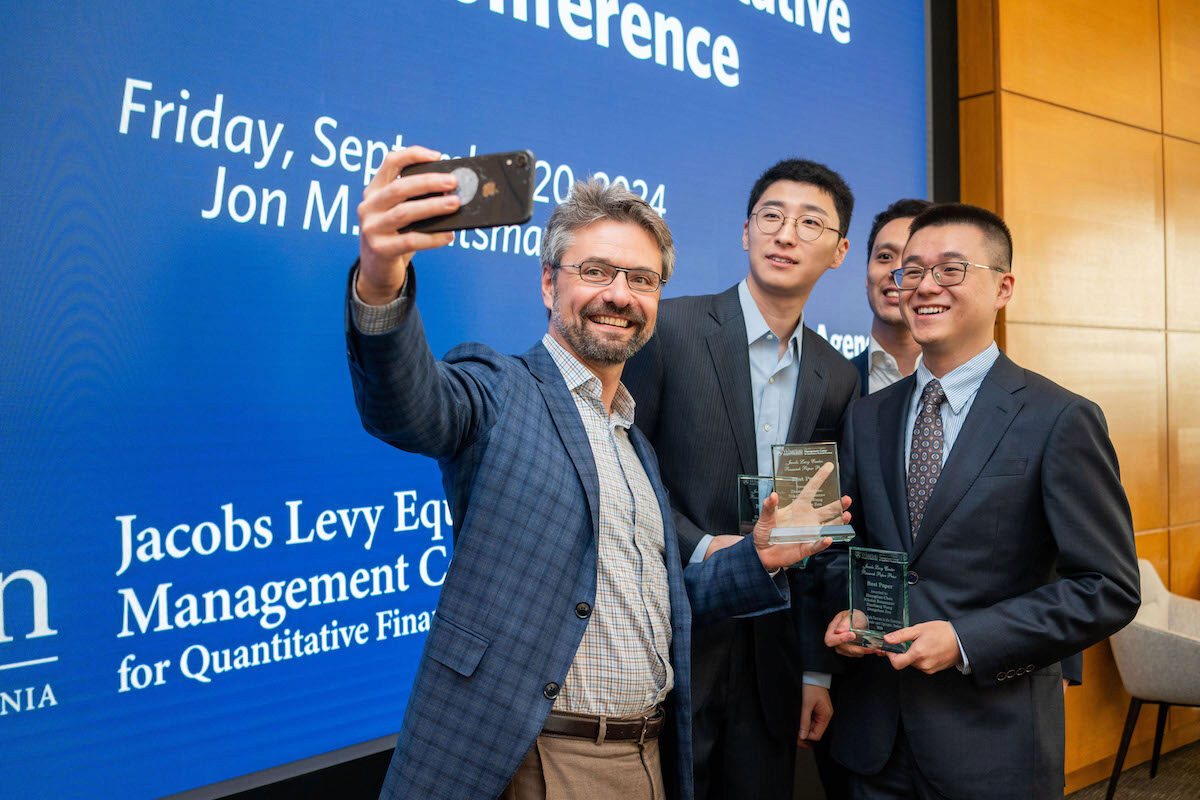 The winners of the 2024 Jacobs Levy Paper Prizes gather for a selfie at the Frontiers in Quantitative Finance Conference