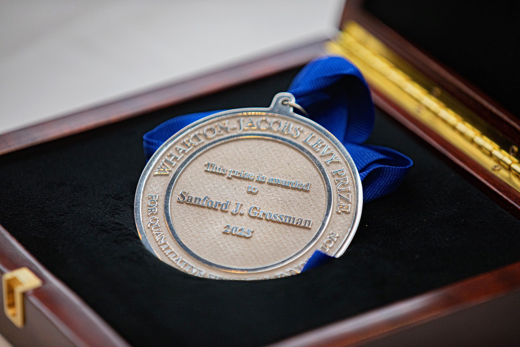 An award medal in a case
